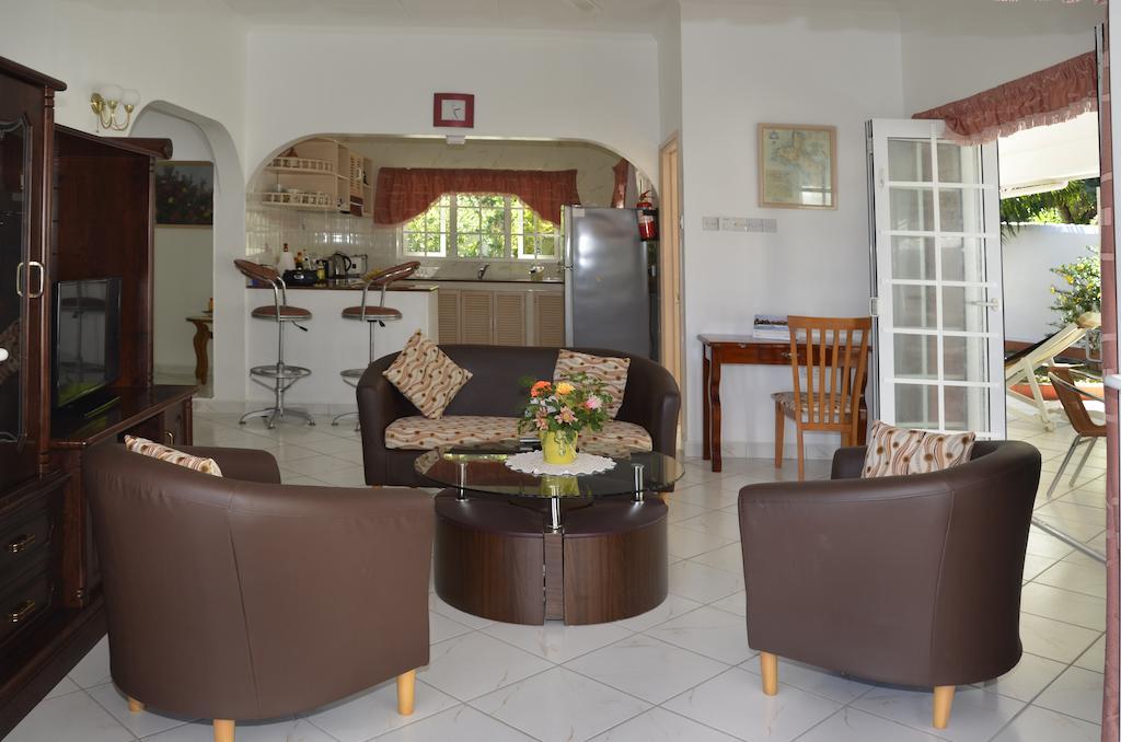 Ixora Villa Anse Royale Quarto foto