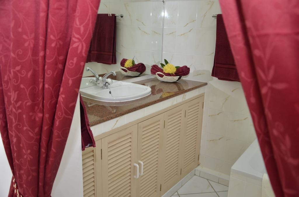 Ixora Villa Anse Royale Quarto foto