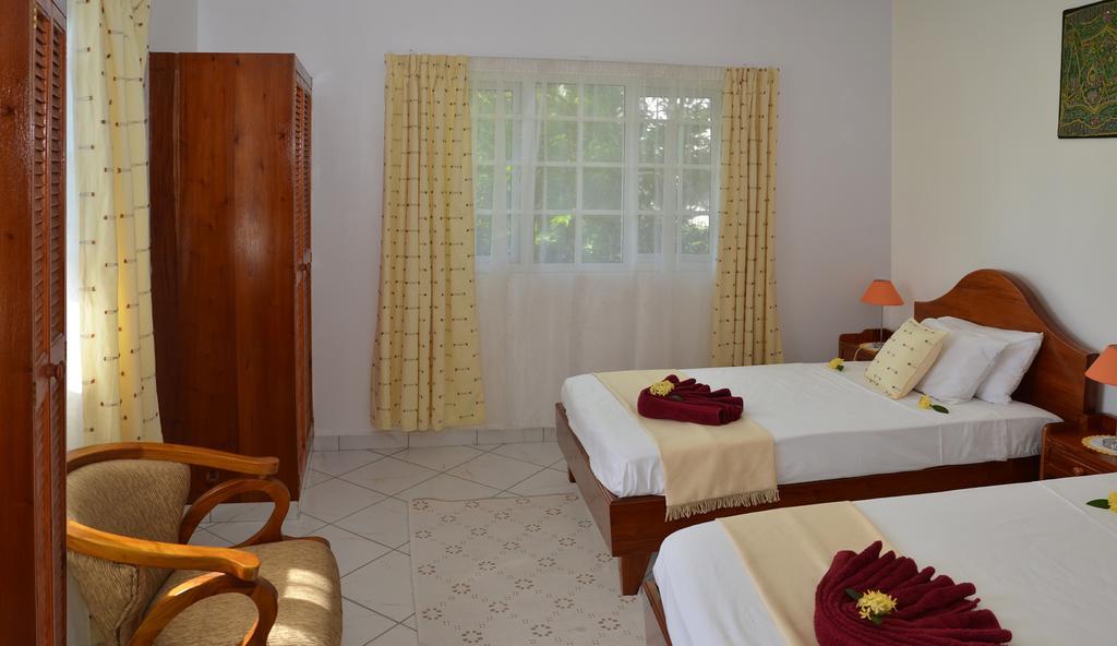 Ixora Villa Anse Royale Quarto foto