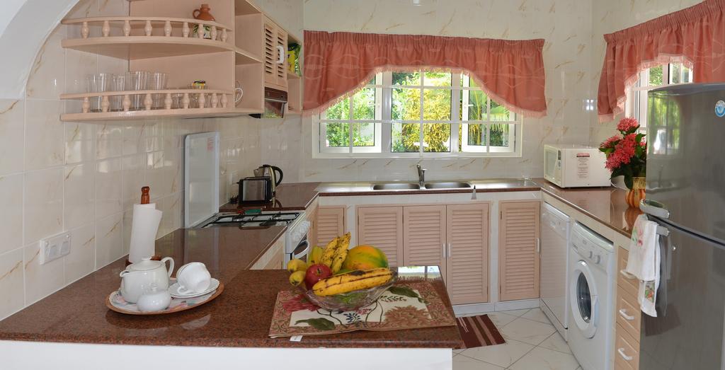 Ixora Villa Anse Royale Quarto foto