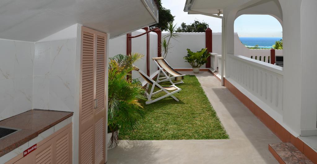 Ixora Villa Anse Royale Quarto foto